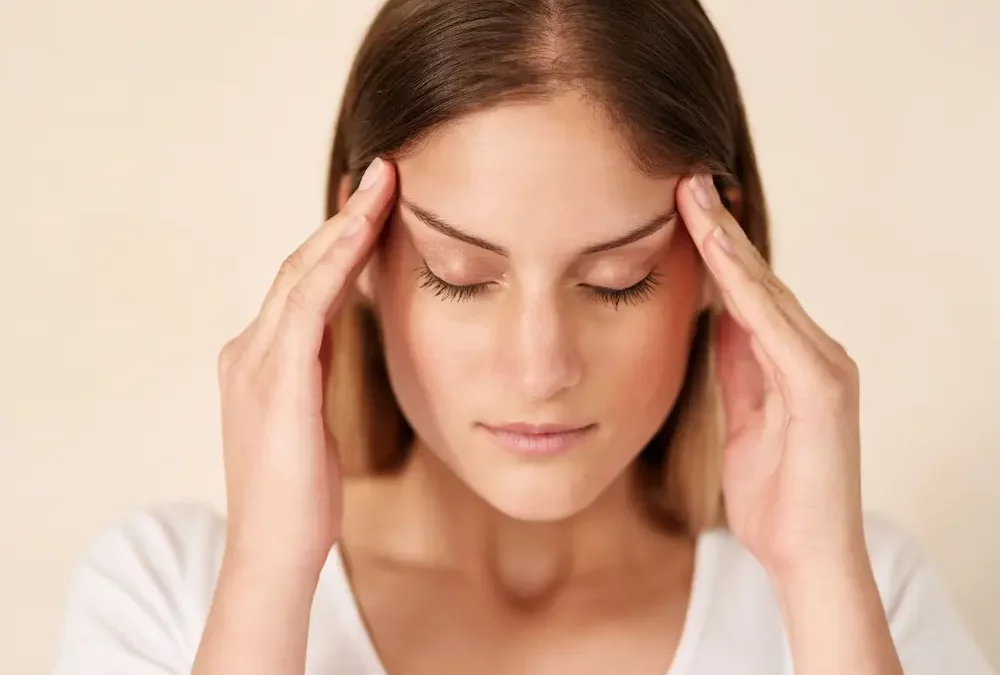 Women experiencing a headache